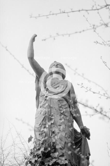 Statue, Highgate Cemetery, Hampstead, London, 1997. Artist: John Gay.