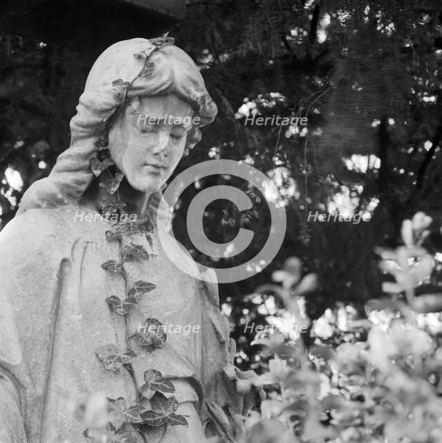 Statue in Highgate Cemetery, Hampstead, London, 1995. Artist: John Gay.