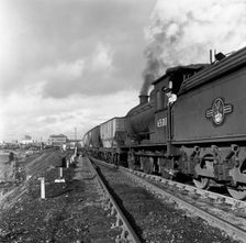 Steam loco no 65811 hauling coal from Lynemouth Colliery, Northumberland, 1963. Artist: Michael Walters