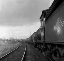 Steam loco no 65811 hauling coal from Lynemouth Colliery, Northumberland, 1963. Artist: Michael Walters