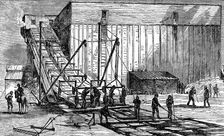 Steam-powered ice elevator, Hudson River near New York, USA, 1875
