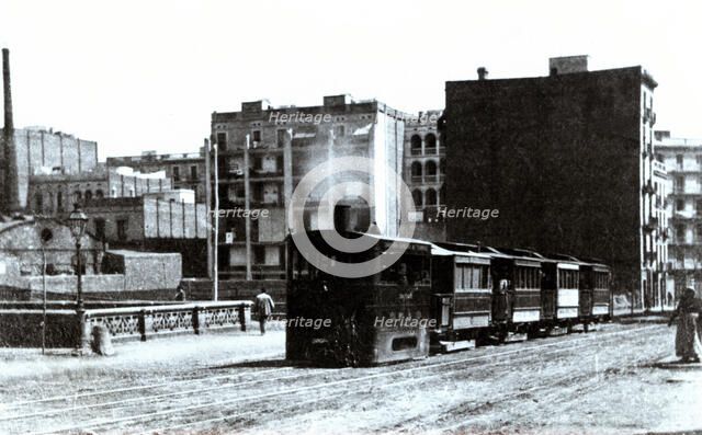 Steam Tram from Barcelona to Sarria, circulating by Balmes Street junction with Aragon Street, 1890.