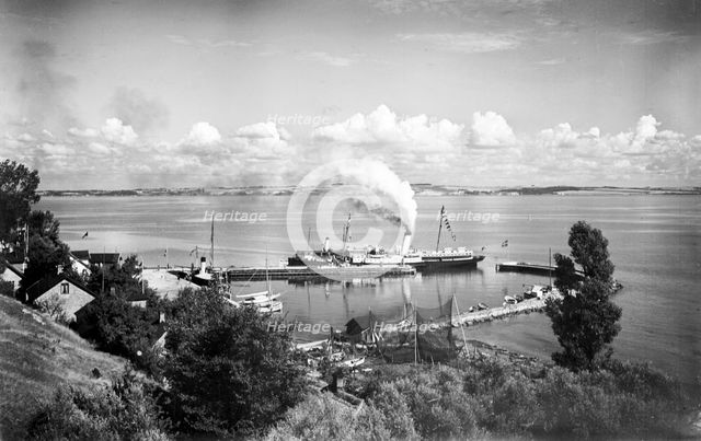 Steamboat in the harbour of Bäckviken, Isle of Ven, Sweden, 1925. Creator: Unknown.