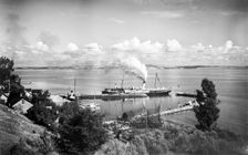 Steamboat in the harbour of Bäckviken, Isle of Ven, Sweden, 1925. Creator: Unknown
