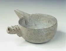Steatite pouring bowl with dragon head handle, Tang dynasty, China, c618-c906. Creator: Unknown