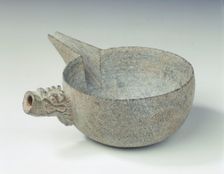 Steatite pouring bowl with dragon head handle, Tang dynasty, China, c618-c906. Creator: Unknown