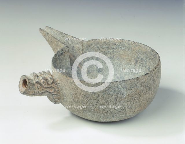 Steatite pouring bowl with dragon head handle, Tang dynasty, China, c618-c906. Creator: Unknown.