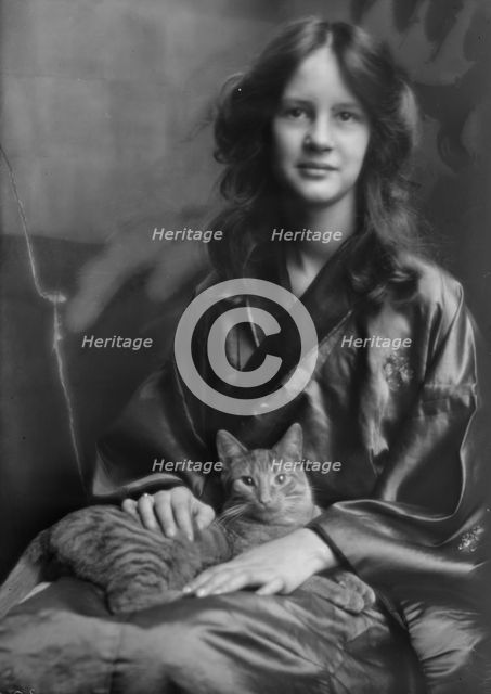 Stebbins, Jocelyn, Miss (Mrs. Fletcher), and Buzzer the cat, portrait photograph, 1912 or 1913. Creator: Arnold Genthe.