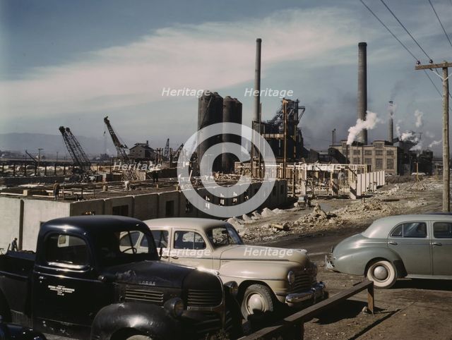 Steel and concrete go into place rapidly as a new steel...Columbia Steel Co., Geneva, Utah, 1942. Creator: Andreas Feininger.