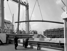 Steel bars being loaded onto the Manchester Renown Manchester, 1964. Creator: Michael Walters
