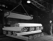 Steel H girders being stacked for distribution, Park Gate, Rotherham, South Yorkshire, 1964. Creator: Michael Walters