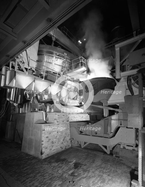 Steel pour from an electric arc furnace, Park Gate Iron & Steel Co, Rotherham, Yorkshire, 1964.  Creator: Michael Walters.