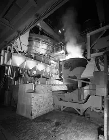 Steel pour from an electric arc furnace, Park Gate Iron & Steel Co, Rotherham, Yorkshire, 1964. Creator: Michael Walters