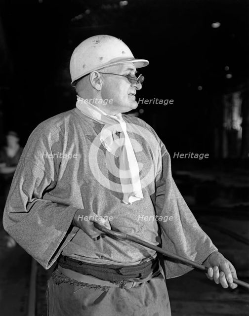 Steel worker, Park Gate steelworks, Rotherham, South Yorkshire, 1964. Creator: Michael Walters.