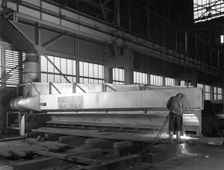 Steelworker at Park Gate Iron and Steel Co, Rotherham, South Yorkshire, April 1964. Creator: Michael Walters