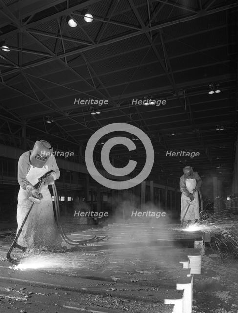 Steelworkers at Park Gate Iron and Steel Co, Rotherham, South Yorkshire, April 1964.  Creator: Michael Walters.