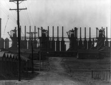 Steelmill and workers houses, Birmingham, Alabama, 1936. Creator: Walker Evans