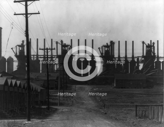 Steelmill and workers' houses, Birmingham, Alabama, 1936. Creator: Walker Evans.