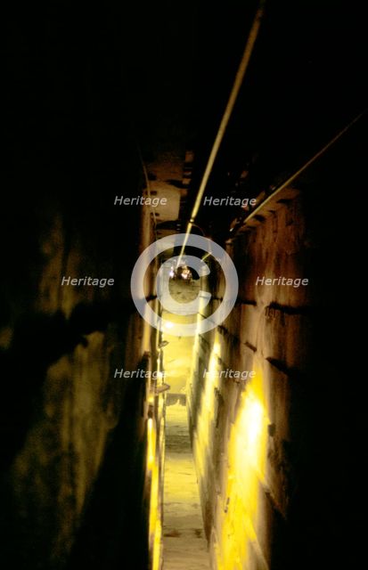 Steep internal stairway inside the Great Pyramid, Gizeh, Egypt. Artist: Unknown