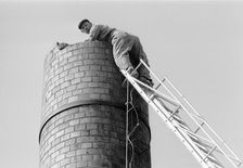 steeplejack up a 6 metre high chimney, Landskrona, Sweden, 1967