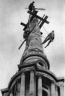 Steeplejacks on the spire of All Saints Church, Poplar, London, 1926-1927