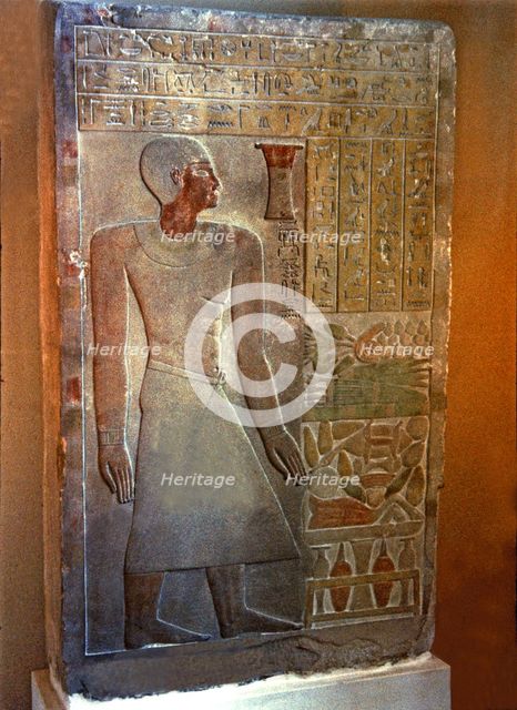 Stela of the Senouret, chief of the royal treasury, with his image and hieroglyphic writing, made…