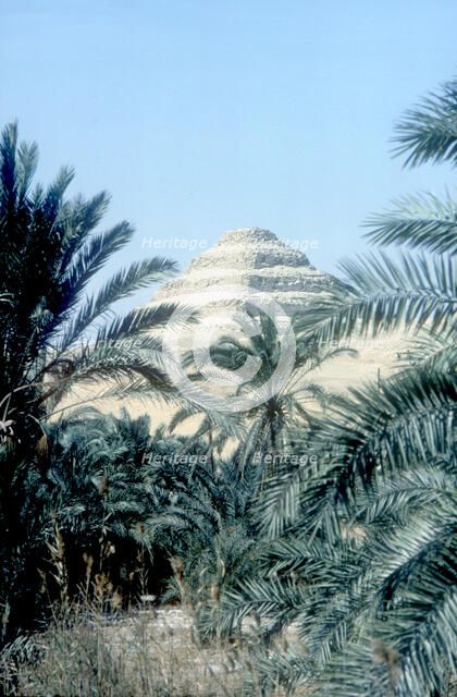 Step Pyramid (behind palms) of King Djoser, Saqqara, Egypt, 3rd Dynasty, c2600 BC. Artist: Imhotep