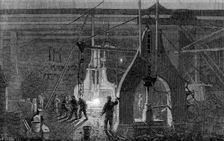 Stephenson's locomotive manufactory at Newcastle-On-Tyne: the steam-hammer, 1864. Creator: Mason Jackson