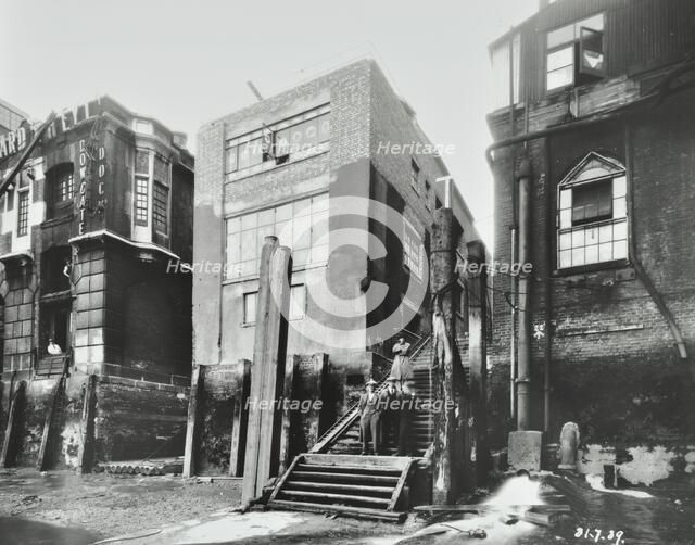 Steps down to the river, Dowgate Dock, Upper Thames Street, City of London, 1939. Artist: Unknown.