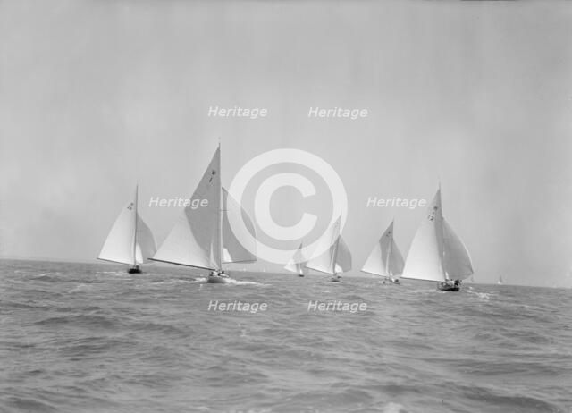 Stern view of W Class boats racing downwind, 1933. Creator: Kirk & Sons of Cowes.