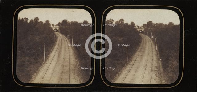 [Stereographic View of Paris-Lyon Railroad Tracks with "Ghost" Train Visible When View..., ca. 1860. Creator: Unknown.