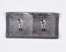 Stereoscopic card showing Bobby Jones addressing the ball for a mashie pitch, c1900. Creator: Unknown