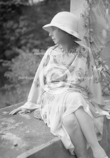 Stettheimer, Florine, Miss, seated outdoors, 1931 Aug. 19. Creator: Arnold Genthe.