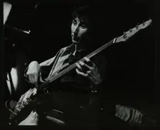 Steve Cook playing bass guitar at The Stables, Wavendon, Buckinghamshire. Creator: Denis Williams