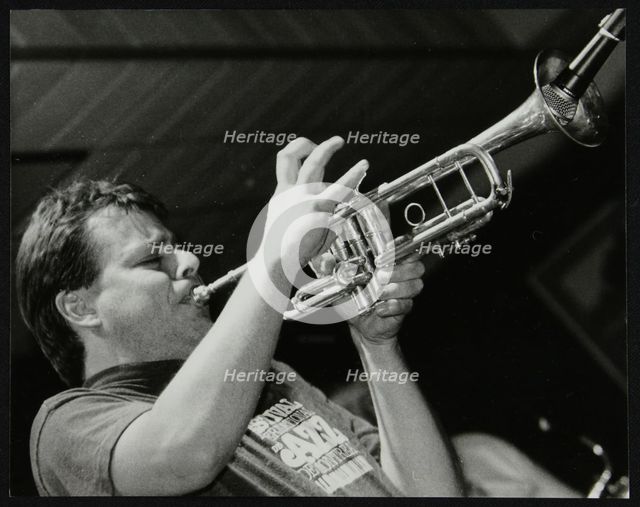 Steve Waterman playing the trumpet at The Fairway, Welwyn Garden City, Hertfordshire, 10 May 1992. Artist: Denis Williams
