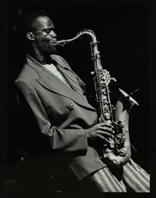 Steve Williamson playing tenor saxophone at the Forum Theatre, Hatfield, Hertfordshire, 1990. Creator: Denis Williams