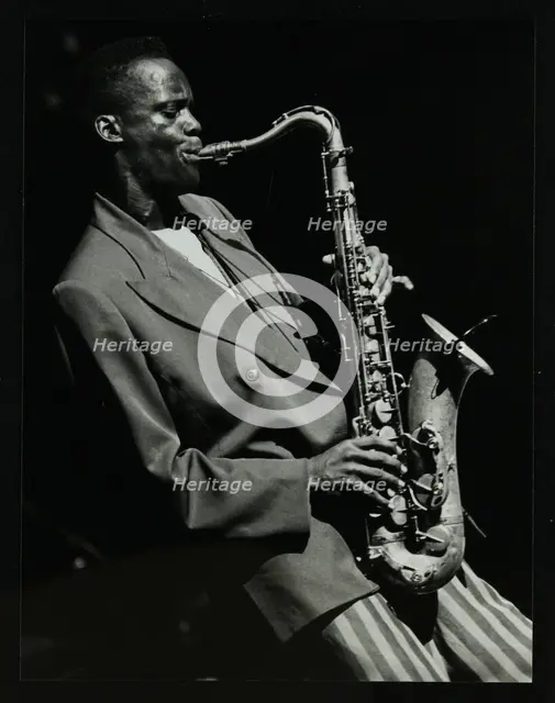 Steve Williamson playing tenor saxophone at the Forum Theatre, Hatfield, Hertfordshire, 1990. Creator: Denis Williams.