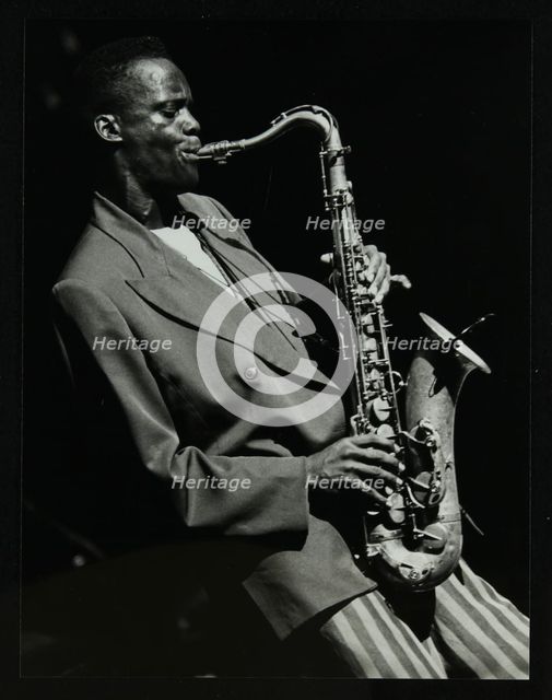 Steve Williamson playing tenor saxophone at the Forum Theatre, Hatfield, Hertfordshire, 1990. Artist: Denis Williams