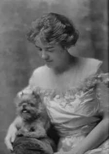 Stevens, J., Miss, with dog, portrait photograph, 1914 June 8. Creator: Arnold Genthe