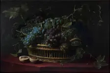Still life with a basket of grapes