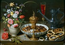 Still life with flowers, goblet and dainties, 1611. Creator: Clara Peeters