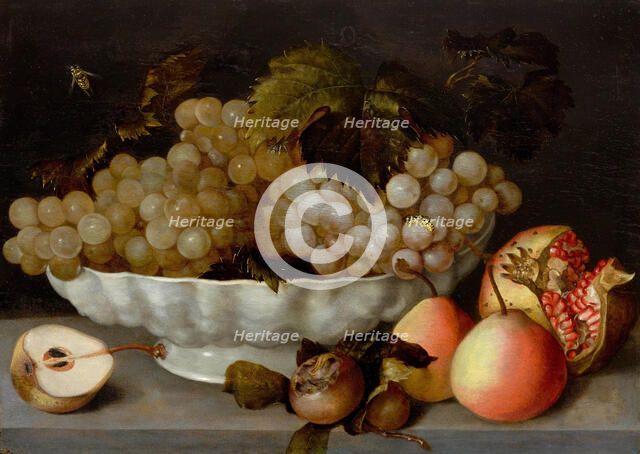 Still life with grapes in a white ceramic bowl, a pomegranate and pears on a..., early 17th cen.. Creator: Galizia; Fede (1578-1630).