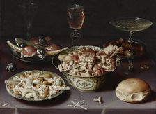 Still life with sweets, chestnuts and a bread roll. Artist: Beert, Osias, the Elder (ca. 1580-1624)
