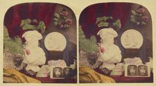 Still life of a bust, stereograph, flowers, and a medallion of Giuseppe (?), about 1860. Creator: Unknown