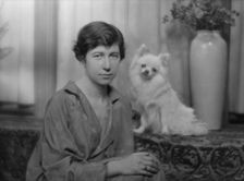 Stimson, Henry B., Mrs., with dog, portrait photograph, 1915. Creator: Arnold Genthe