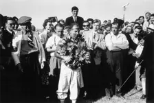 Stirling Moss, winner of the British Grand Prix, Aintree, 1955