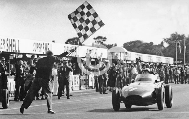 Stirling Moss winning 1957 British Grand Prix at Aintree in the Vanwall. Creator: Unknown.