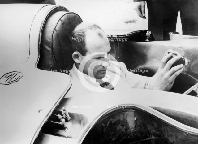 Stirling Moss in the MG EX181, 1957. Artist: Unknown