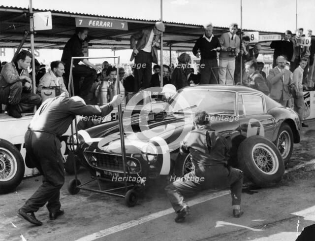 Stirling Moss in a Ferrari, Goodwood, 1961. Artist: Unknown