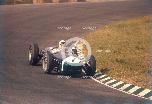 Stirling Moss in a Lotus 18, Dutch Grand Prix, Zandvoort, 1960. Artist: Unknown